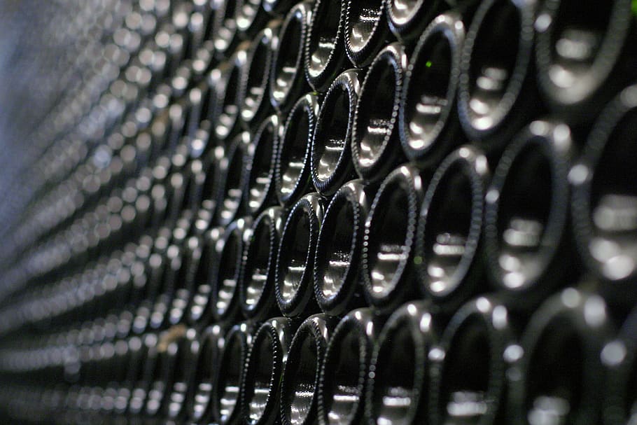 wine cellar, wine bottle, wine, in a row, selective focus, indoors, large group of objects, close-up, repetition, full frame