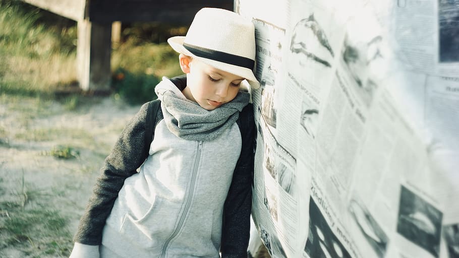 young, child, thinking, pensive, hat, newspaper, beach, sand, thoughful, think