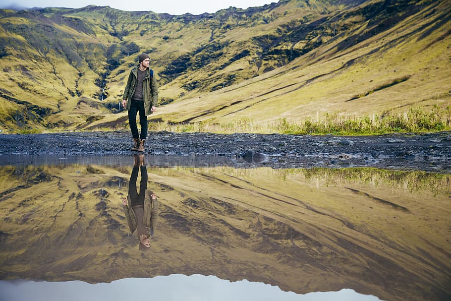 young, caucasian hiker, reflection, lake, adventure, boot, green, jacket, landscape, mountain