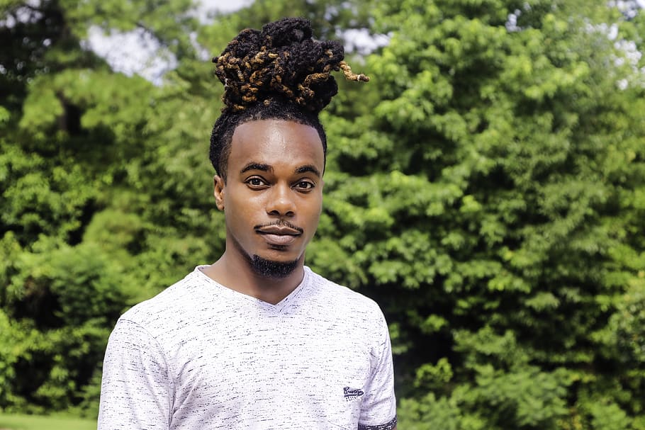 black man, young man, african-american, male, millennial, man bun, dreads, portrait, tree, young adult