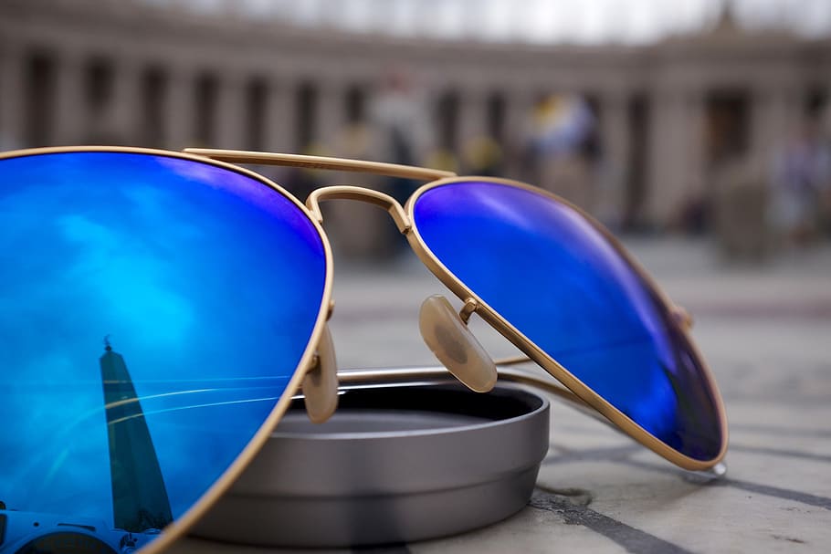 sunglasses, blue, reflection, objects, architecture, building exterior, day, built structure, travel, focus on foreground