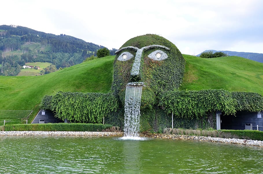 swarovski giant, giant head, swarovski kristallwelten, waterfall, swarovski, austria, water, plant, architecture, sky