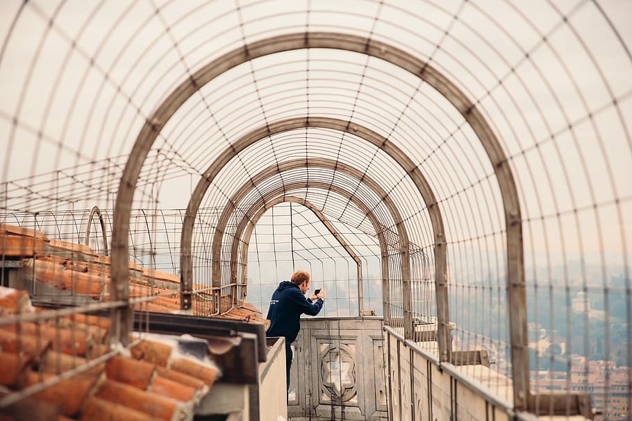 young, caucasian man, taking, rooftop walkway, 25-30 year old, Architecture, Camera, Fall, Holiday, Picture