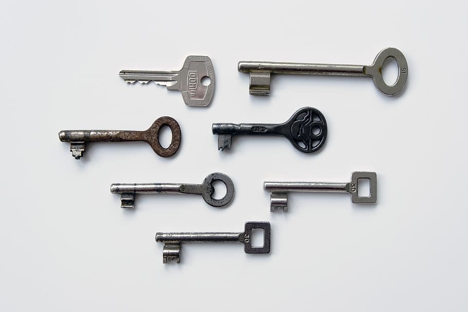 door keys, various, security, studio shot, white background, metal, indoors, cut out, group of objects, silver colored