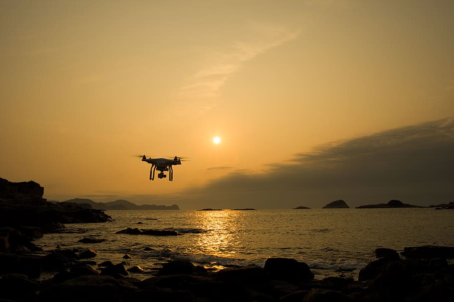 drone, flying, sunset, sunrise, sea, water, sky, orange color, beauty in nature, scenics - nature