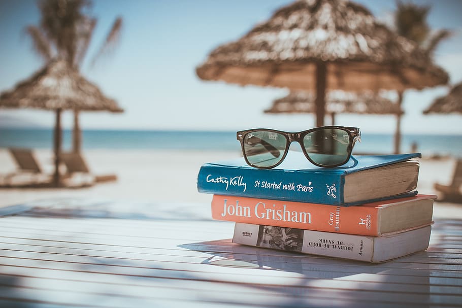 libros, lectura, playa, vacaciones, gafas de sol, relax, relajación, resort, isla, océano