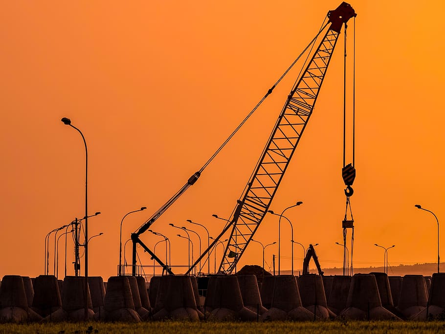 sunset, crane, pylons, industry, machine, construction site, sky, silhouettes, dusk, orange color