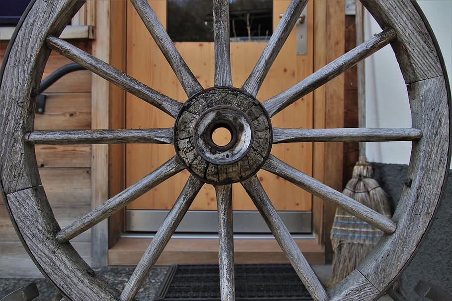 the door, entrance, target, closed, wooden, wheel, ornament, an isolated, nostalgia, wheels