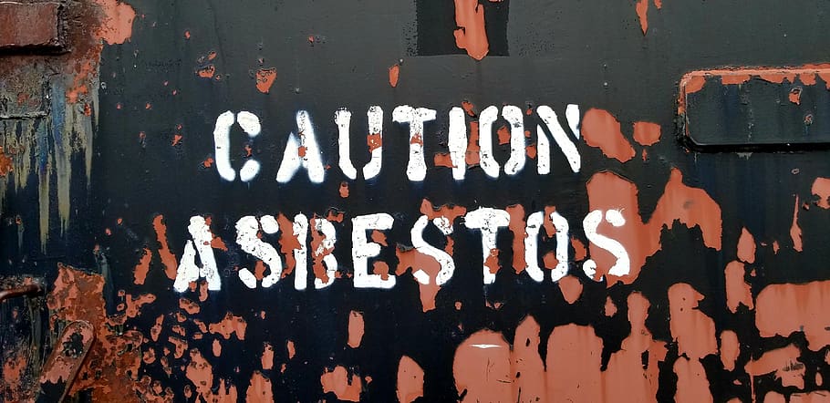 caution sign, asbestos, rust, abandoned, air force base, bunker door, paint, day, wall - building feature, architecture