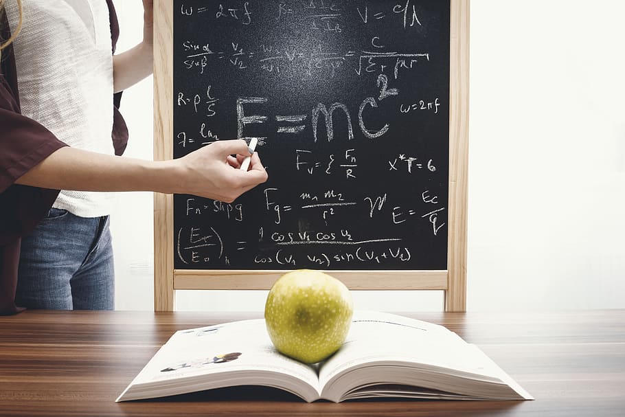 teacher teaching, writes, mathematical, equations, blackboard., education, school concept, concept., blackboard, board