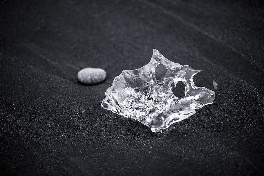 stone, sand, ice, black and white, single object, close-up, still life, nature, focus on foreground, textured