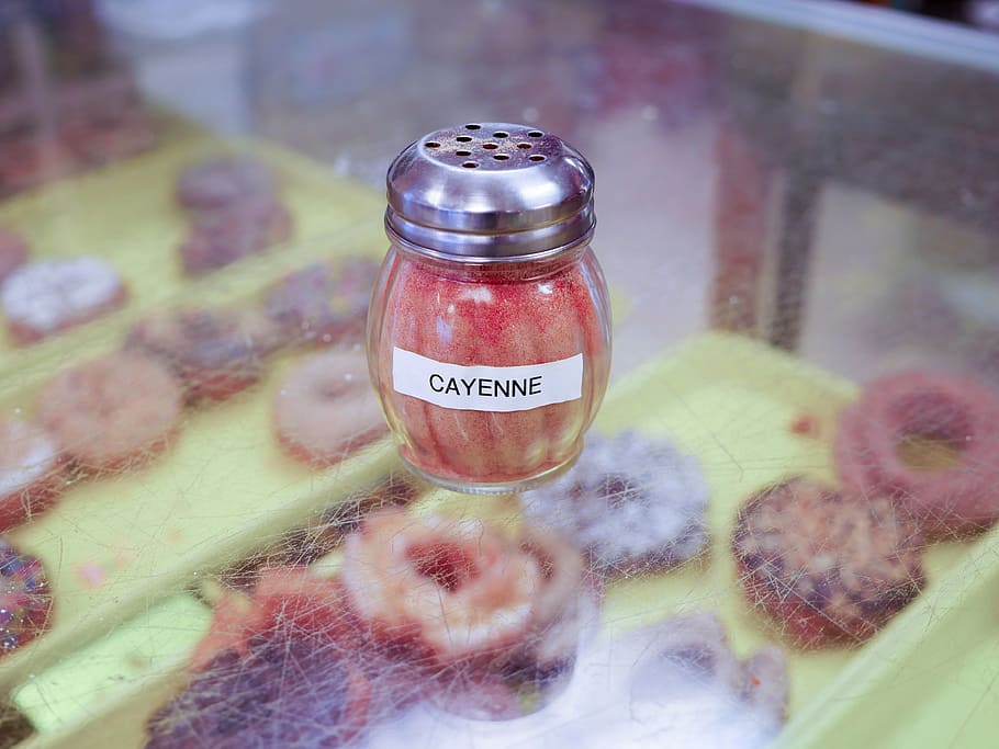 cayenne spice, glass shaker, sitting, donut shop, shop., glass, cayenne, food, dispenser, container