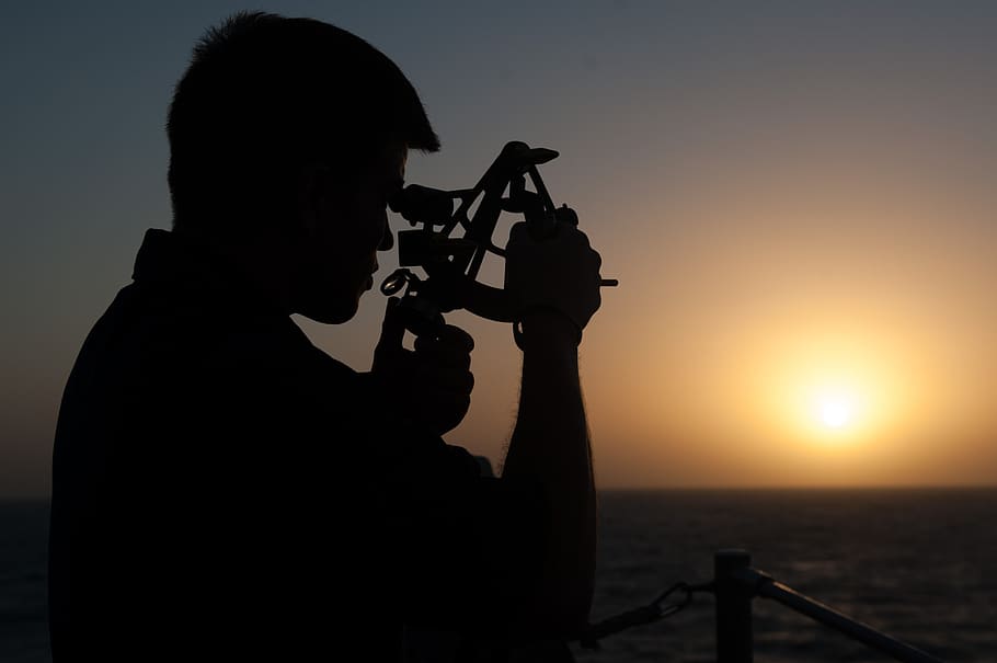 sailor, shadow, sextant, instrument, outdoors, sunset, evening, ocean, sea, horizon