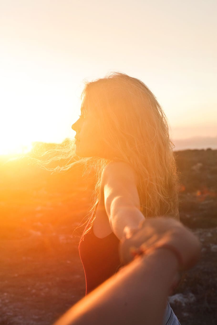 young, blonde, woman, looking, sunset, hand, held, another, 20-25 year old, horizon
