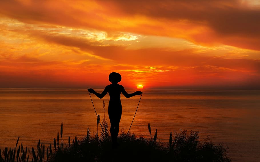 exercising, jump rope, sunset., jumping rope, woman, exercise, sea, ocean, water, dusk