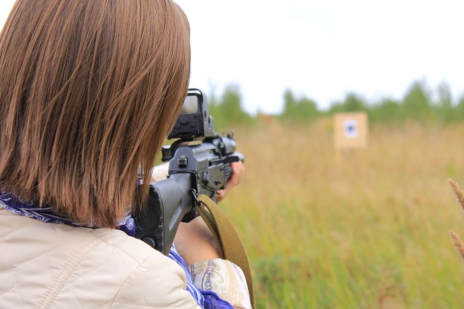 target, shooter, the sight, weapons, woman, rear view, one person, adult, aiming, headshot