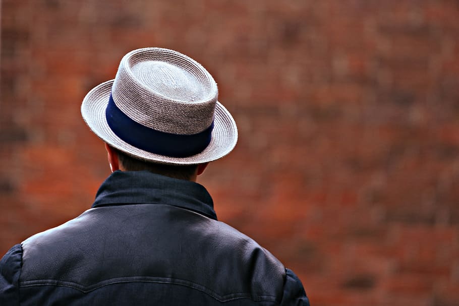 man, hat, back, shoulders, standing, headgear, from behind, wall, clothing, headshot