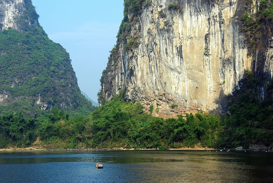 china, yangshuo, li river, navigation, boat, solitude, reflections, mountains, fisherman, water