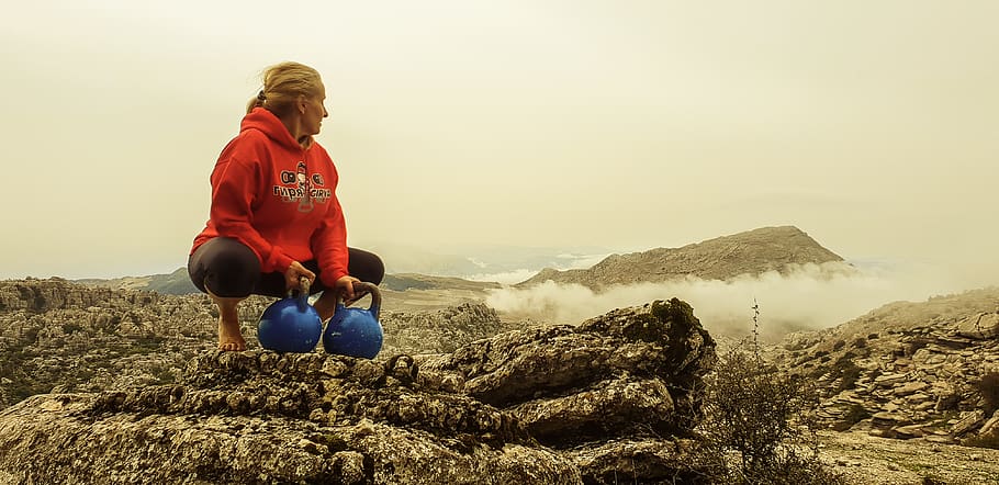 woman, lady, girl, blonde, kettle bell, mountain, kettlebell training, mist, crouching, real people