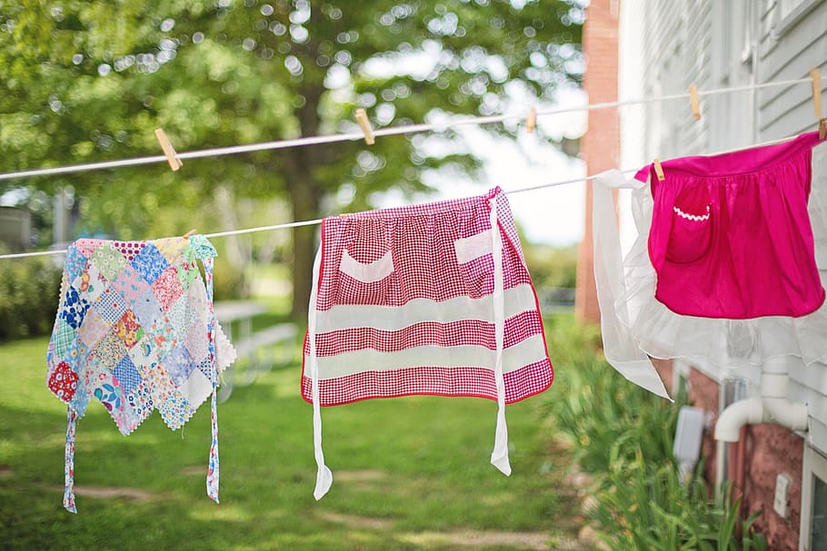 aprons, vintage, clothesline, colorful, laundry, hanging, plant, drying, focus on foreground, day