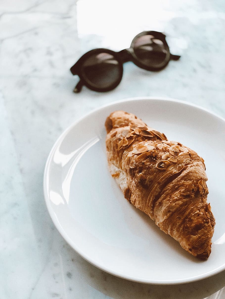 breakfast, croissant, sunglasses, pastry, food, snack, plate, white, food and drink, still life