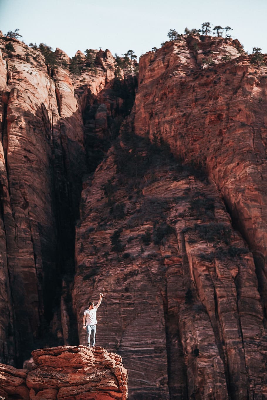 young, caucasian man, standing, layered, rock, grand, 25-30 year old, Adventure, America, Canyon