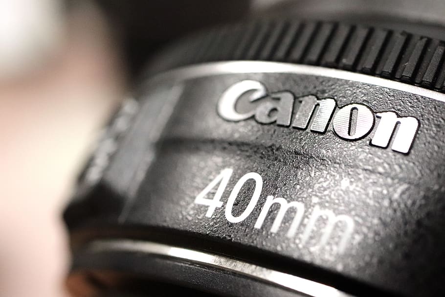 cannon, canon 40mm, lens, camera, optical, this home, this special steel company, text, close-up, indoors