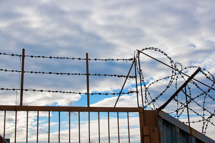 barbedwire, barbwire, blue, caution, cautious, chain-linkfence, control, danger, dangerous, fence
