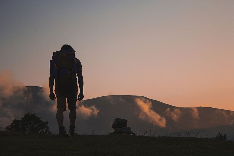 hiking, hiker, backpack, outdoors, mountains, sunset, sky, shorts, tshirt, guy