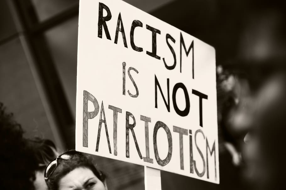 sign, society, racism, patriotism, protest, hate, love, text, western script, communication