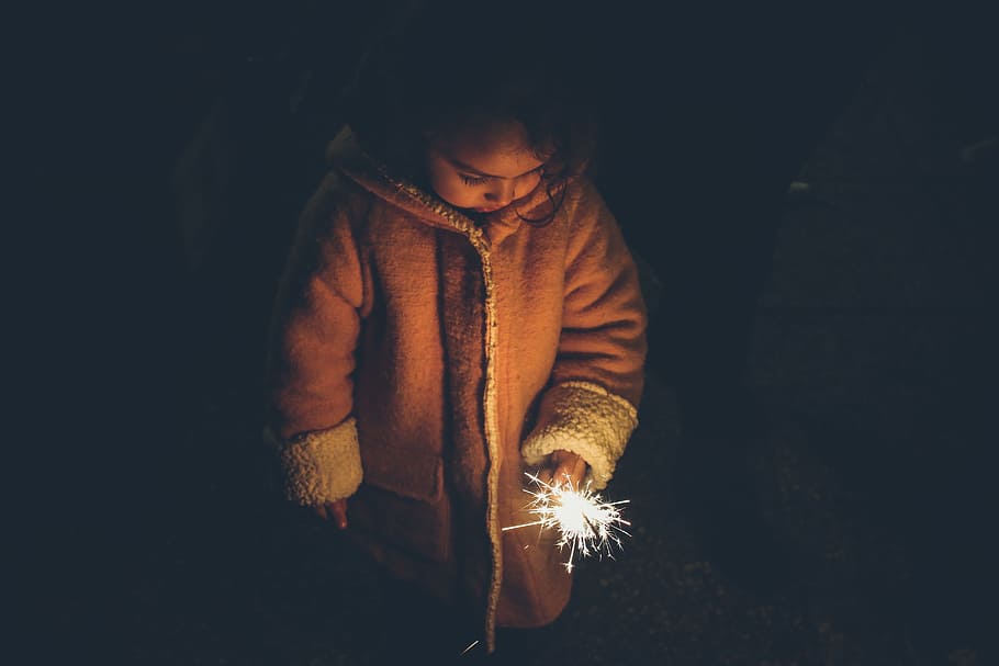 people, kid, child, cold, night, dark, jacket, fireworks, fire, spark