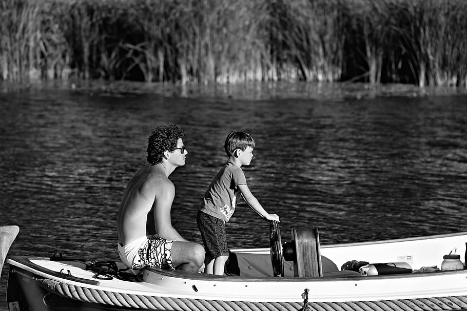 father, son, man, boy, boat ride, steering wheel, learning, leisure, fun, happiness