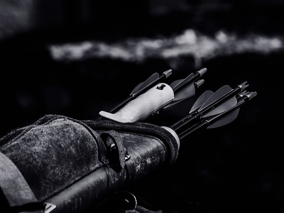 black and white, monochrome, bag, leather, arrow, focus on foreground, weapon, close-up, gun, musical instrument