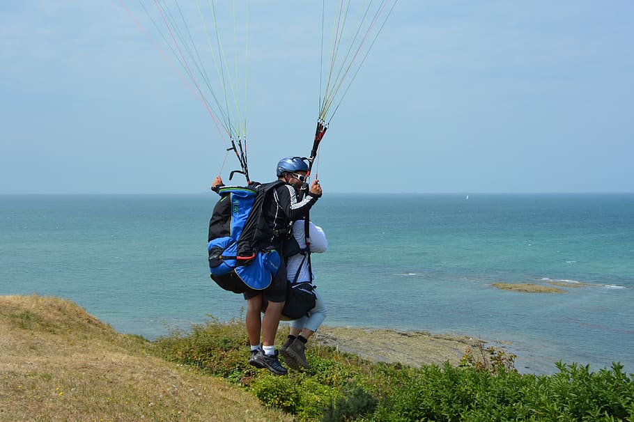 paragliding, paragliding bis place, duo, two harnesses, baptism paragliding, granville normandy, france, wind, air, fly
