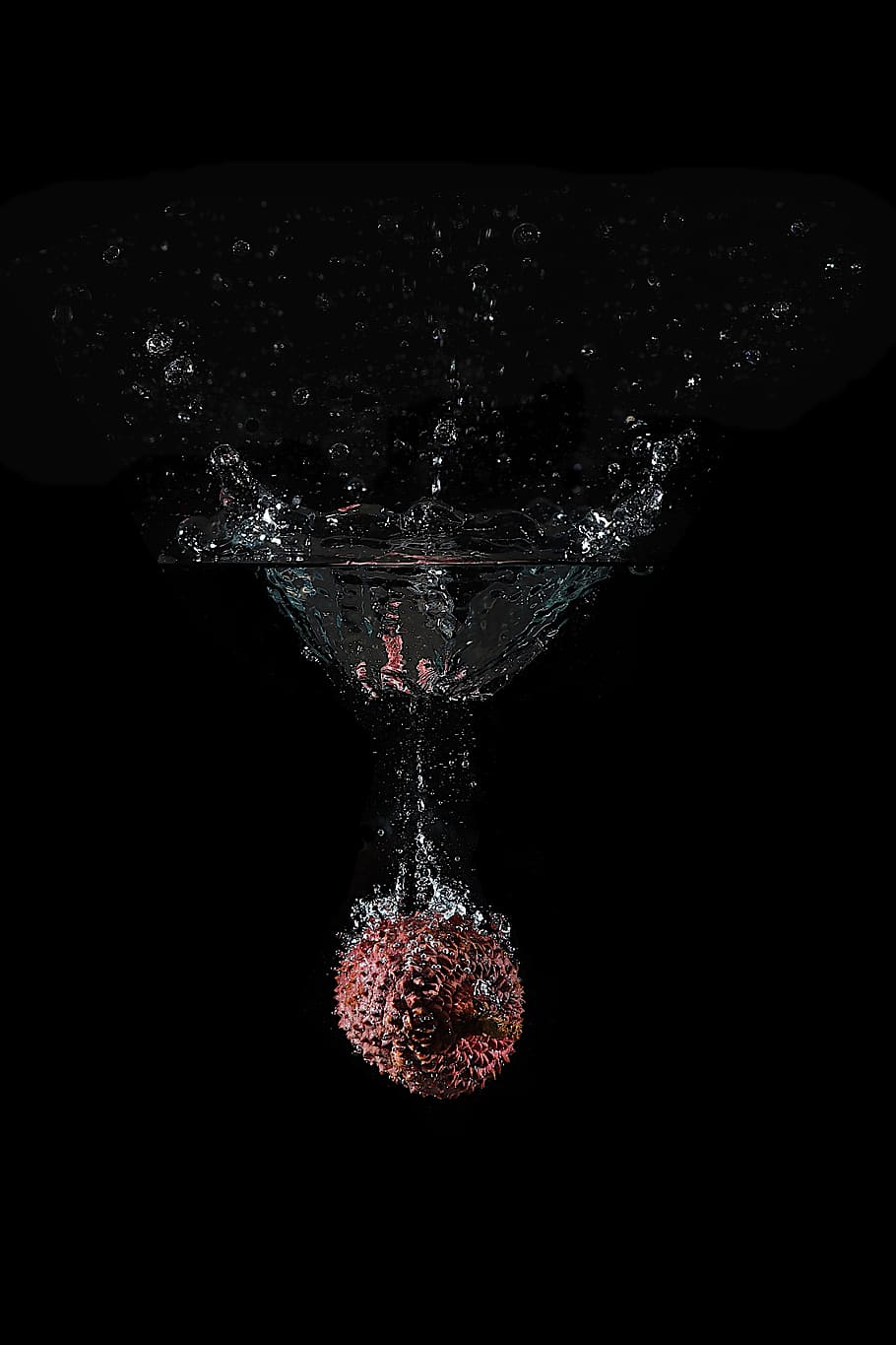 lychee, fruit, water, drip, wet, black background, studio shot, indoors, splashing, close-up