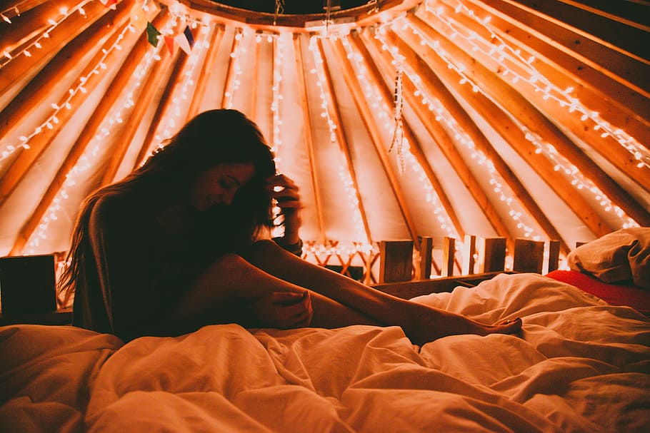 woman, attractive, lights, bokeh, model, warm, legs, long hair, bed, covers