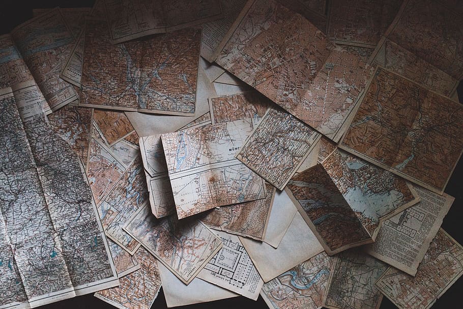 brown, maps, orange, papers, indoors, high angle view, map, paper, pattern, wood - material