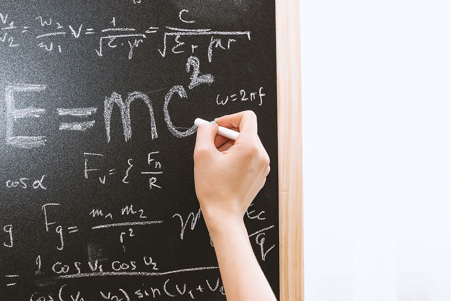 female, hand, holding, white, chalk, front, blackboard, einstein formula, formula., education