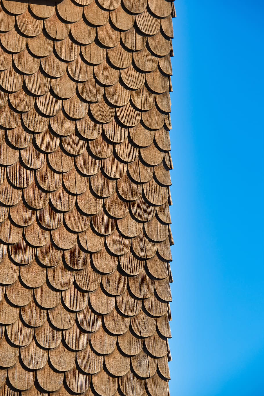 wood shingles, shingle, facade, facade cladding, sky, blue, pattern, day, clear sky, large group of objects