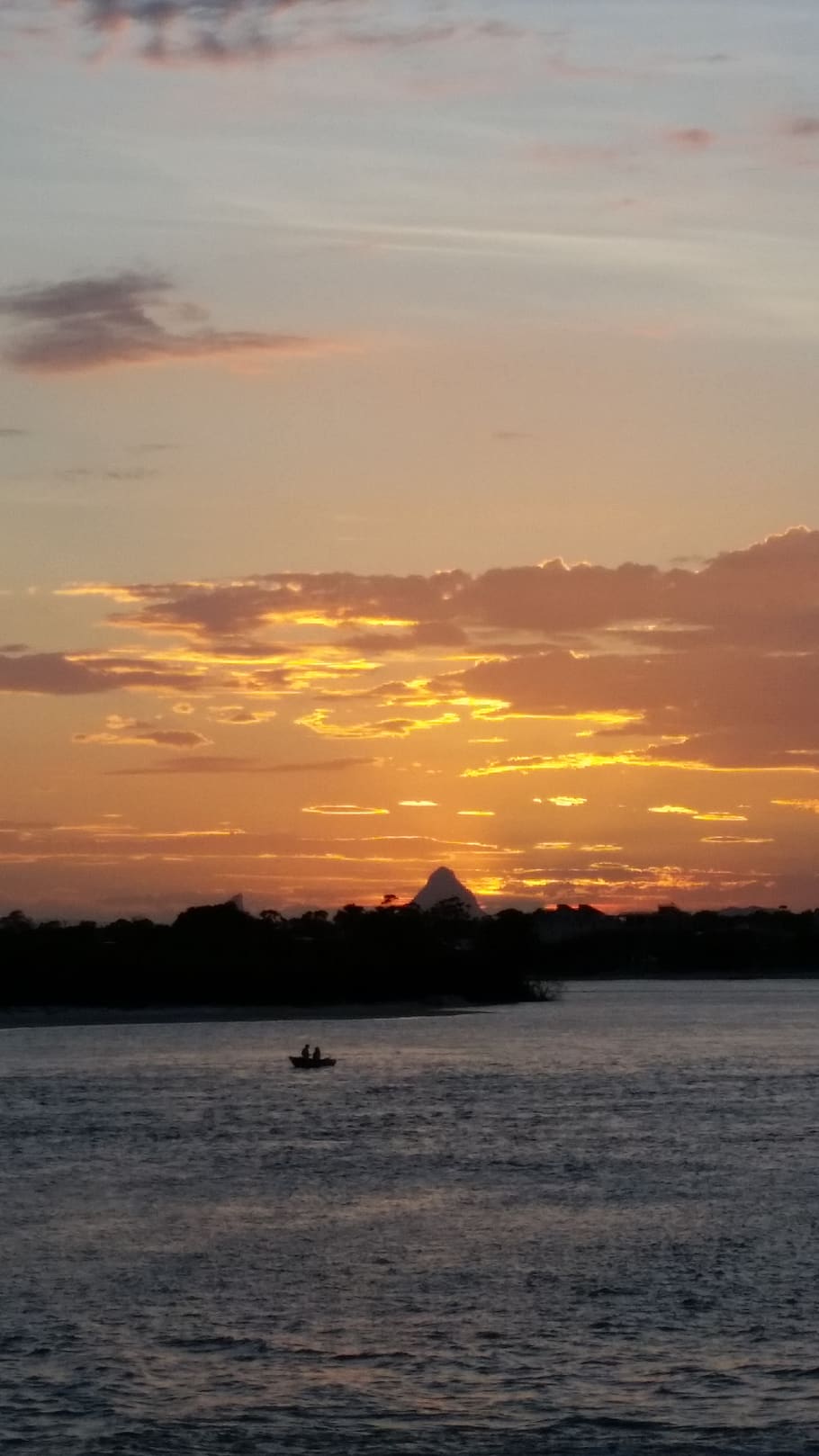 sunset with boat, sunset over water, glasshouse mountains sunset, australia, sunset, sky, scenics - nature, water, beauty in nature, orange color