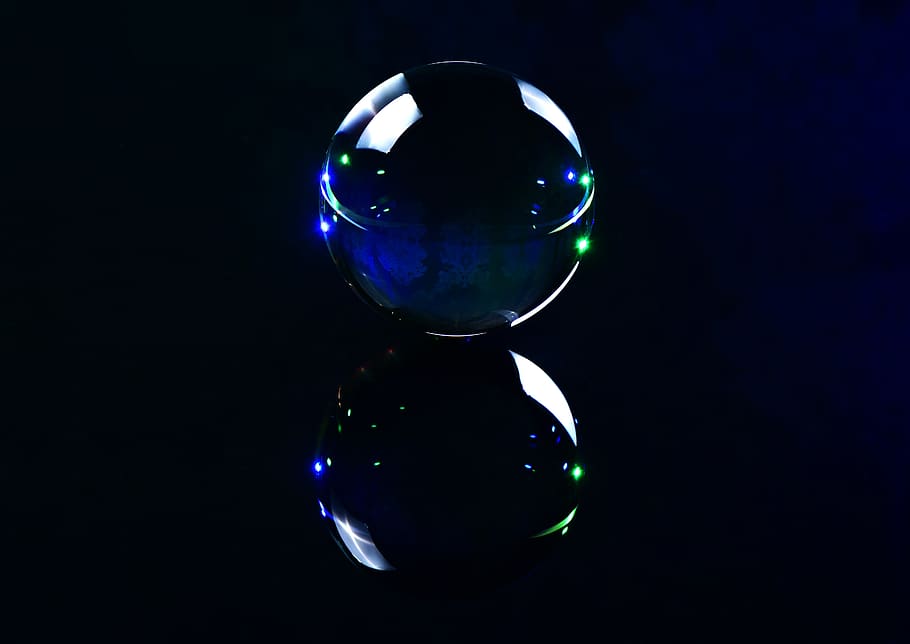 crystal ball-photography, ball, lights, colorful, magic, mirroring, reflection, studio shot, black background, sphere