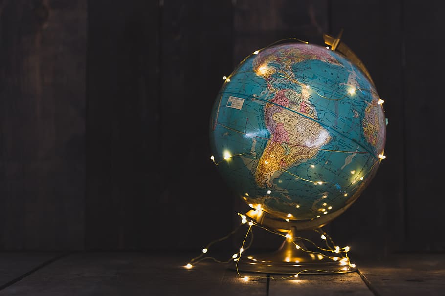 antique, globe, string, lights, wrapped, around, wooden, surface, ball, background