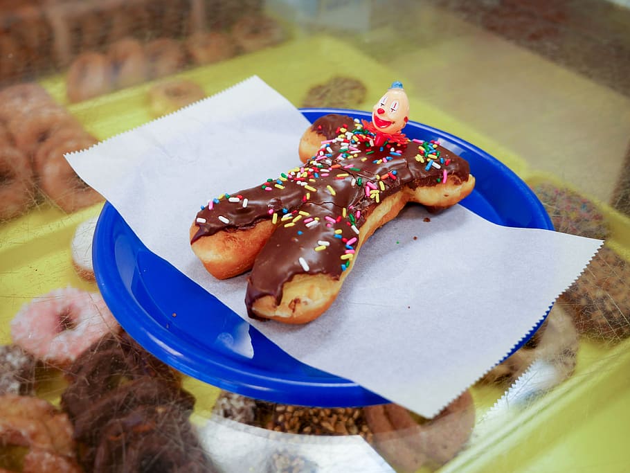 clown donut, sitting, blue, plate, shop., bakery, breakfast, calories, chocolate, colorful