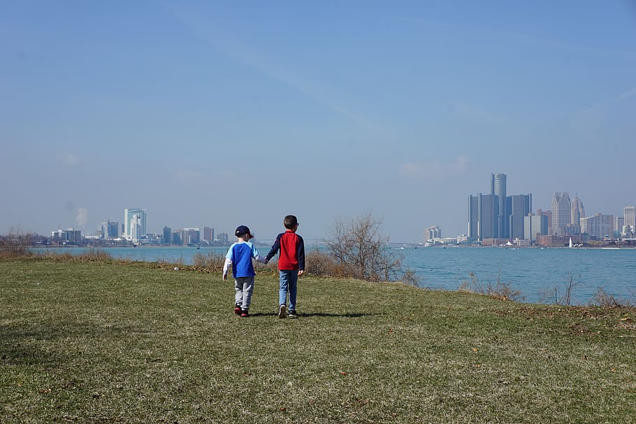 brothers, boys, detroit, walking, belle isle, detroit river, holding hands, friends, brotherly love, springtime
