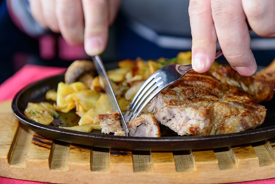 food, restaurant, dinner, fork, knife, healthy, table, dining room, steak, food and drink