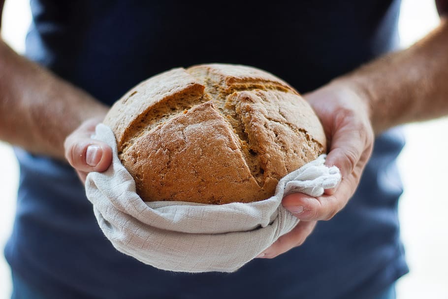 baked bread loaf, food and Drink, bread, breads, human hand, hand, human body part, food, one person, holding