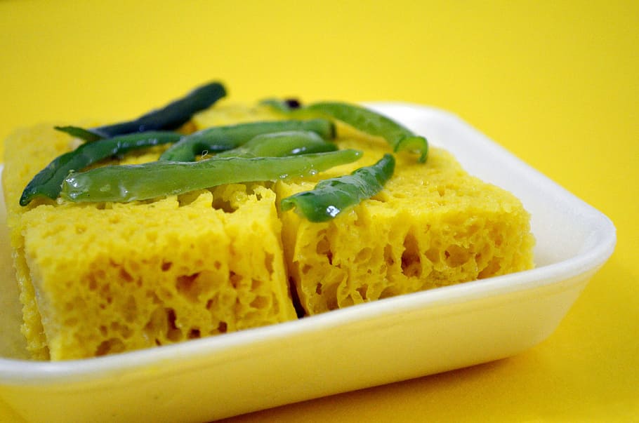 dhokla, food, food and drink, studio shot, indoors, colored background, yellow, freshness, yellow background, healthy eating