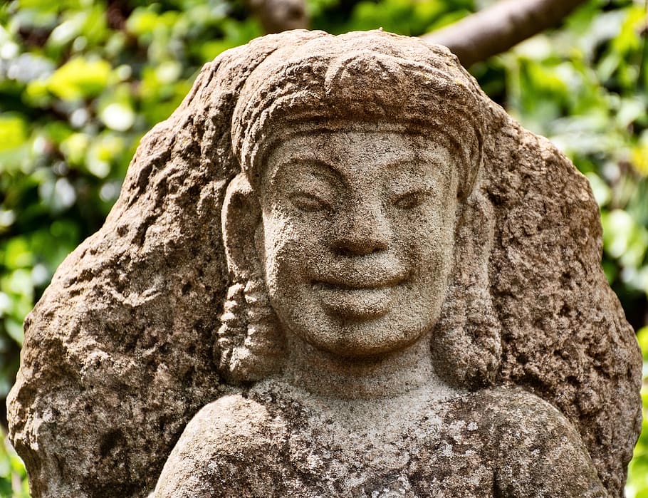 garden, greenery, nature, foliage, stone carving, asian influence, statue, carved figure, peace, serene