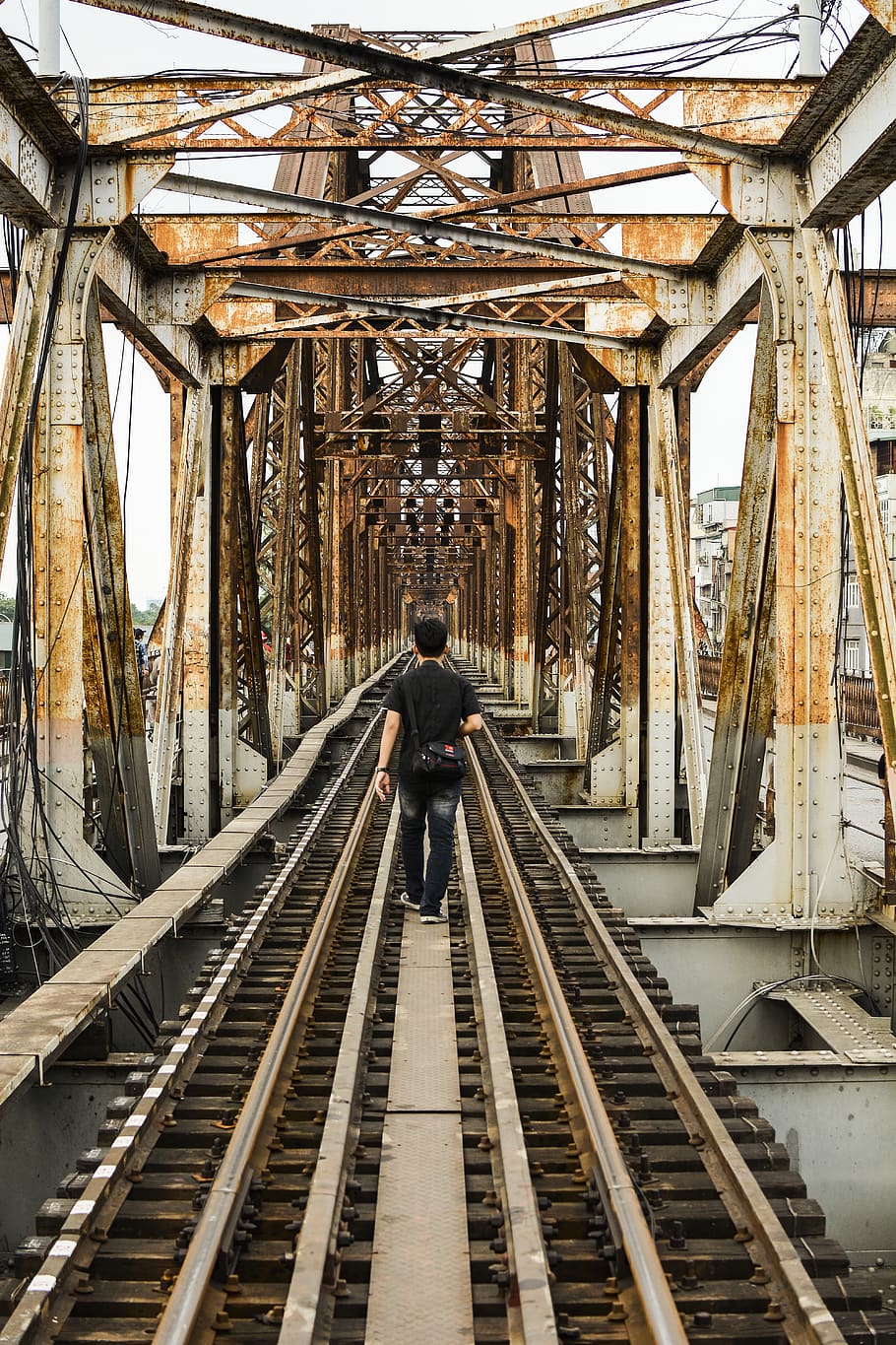 bridge, architecture, steel, france, symmetric, rear view, one person, built structure, track, real people