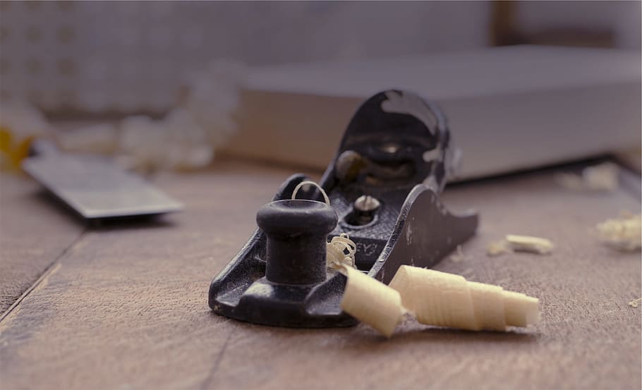 woodworking, shavings, indoors, table, close-up, selective focus, metal, security, safety, still life